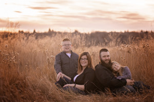 A family picture taken in the fall at Fish Creek Park in Calgary Alberta