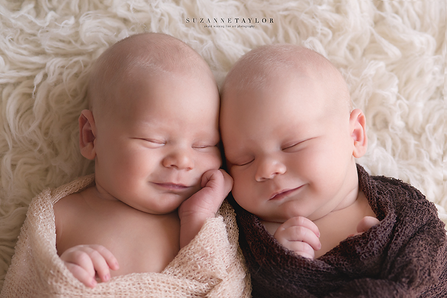 Twin brothers from Fort McMurray smile during their newborn session