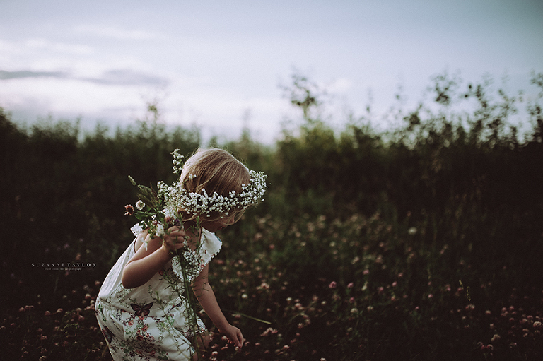 Red Deer Children love picking flowers in the summer with Suzanne Taylor Photography