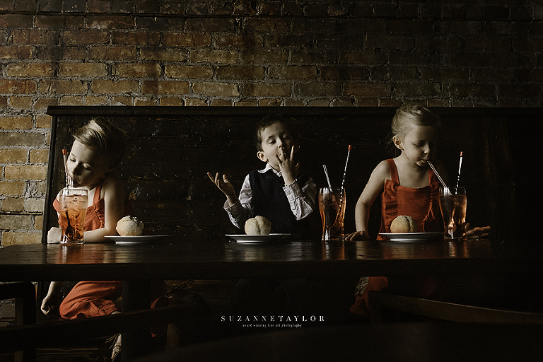 Lacombe photographer Suzanne Taylor Photography captured these three triplets at Sweet Capone's in Lacombe, AB